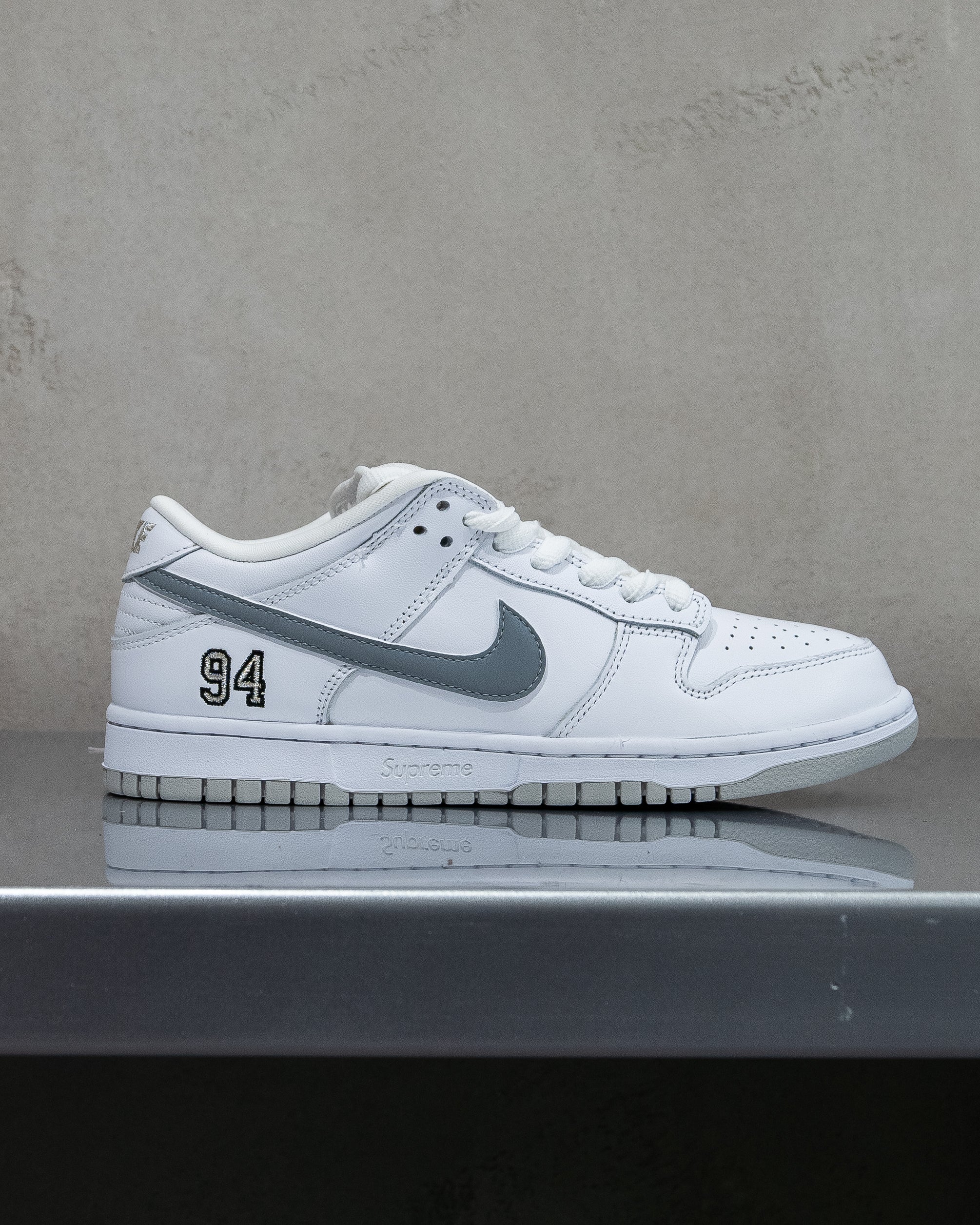 Nike SB Dunk Low ‘Supreme 94 White Metallic Silver’