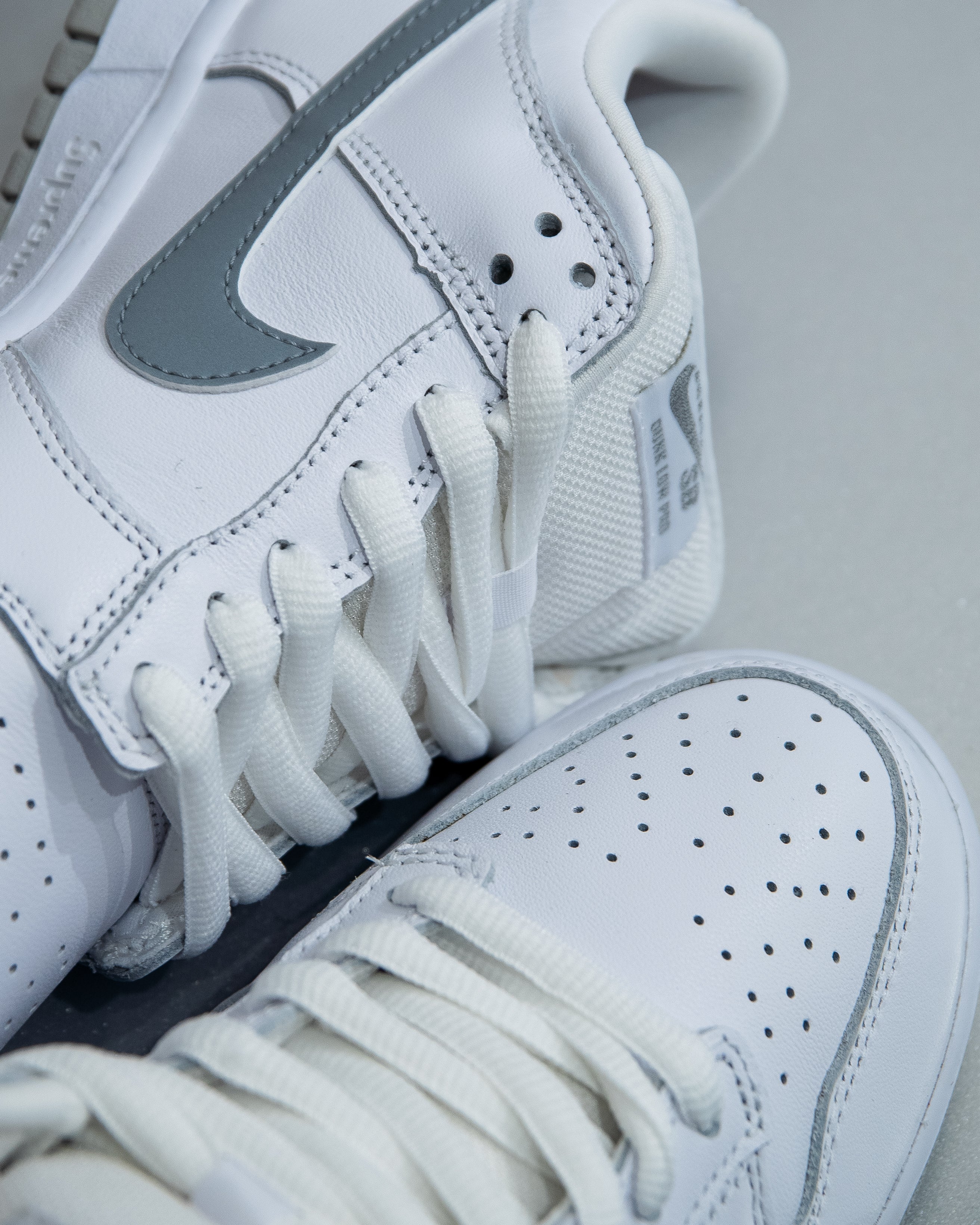 Nike SB Dunk Low ‘Supreme 94 White Metallic Silver’