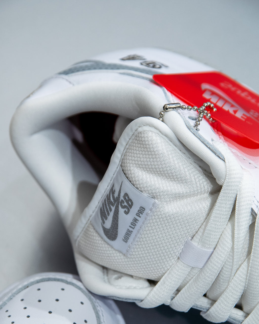 Nike SB Dunk Low ‘Supreme 94 White Metallic Silver’