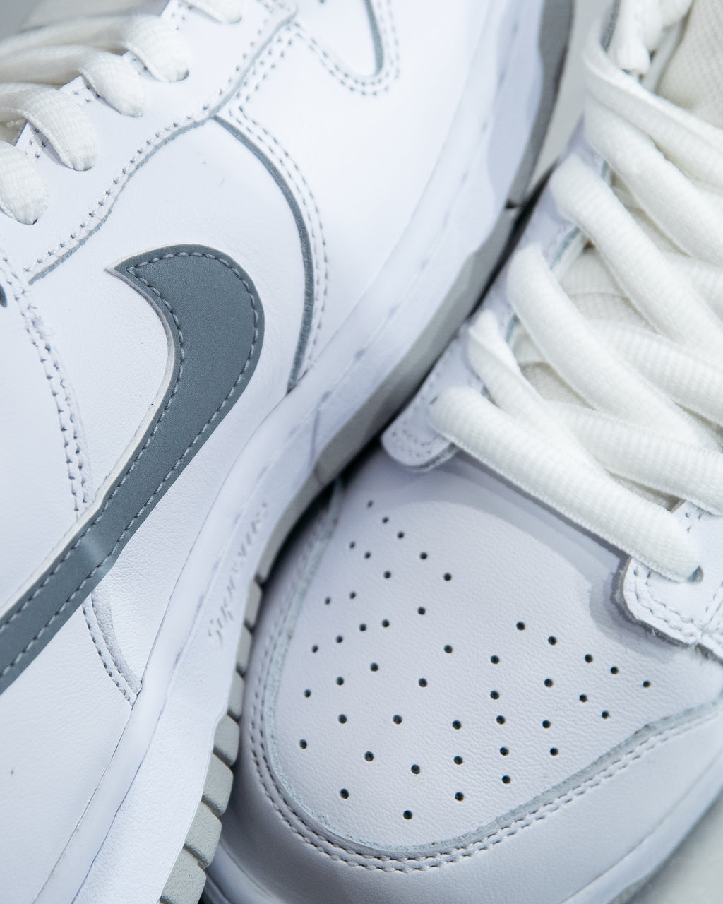 Nike SB Dunk Low ‘Supreme 94 White Metallic Silver’