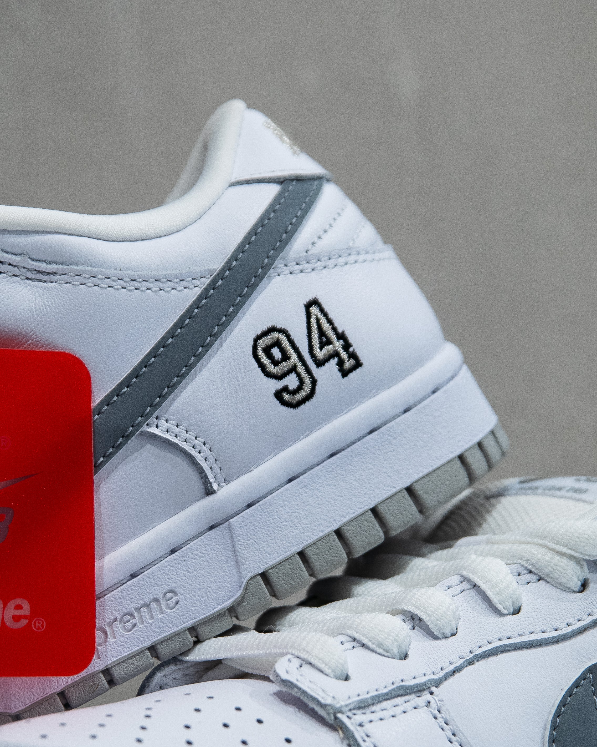 Nike SB Dunk Low ‘Supreme 94 White Metallic Silver’