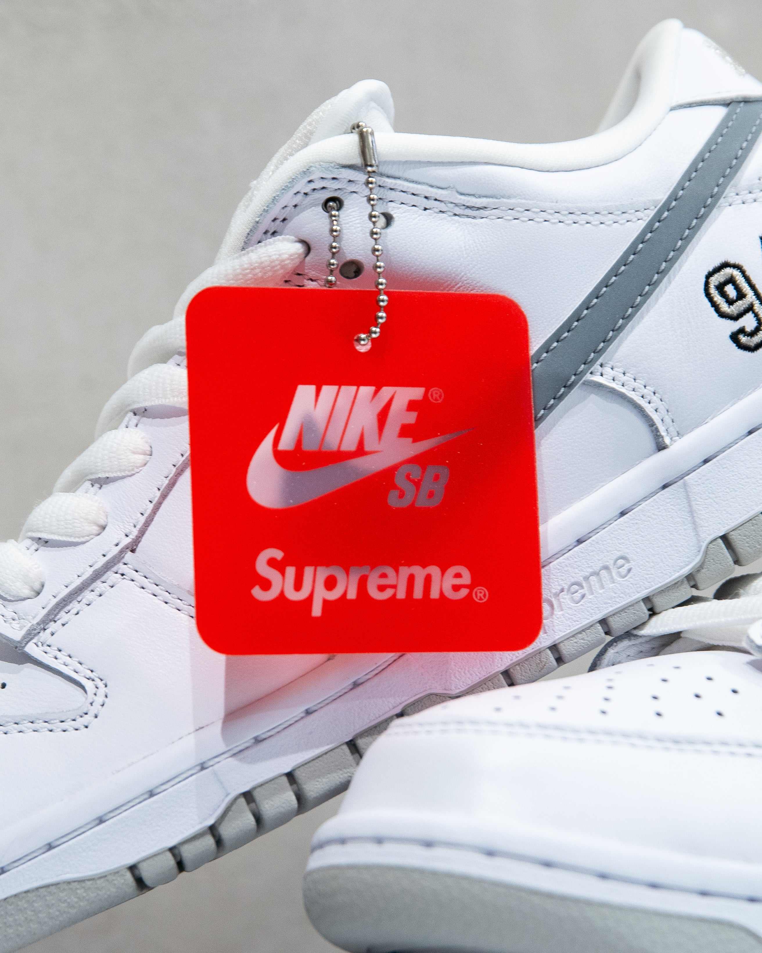 Nike SB Dunk Low ‘Supreme 94 White Metallic Silver’