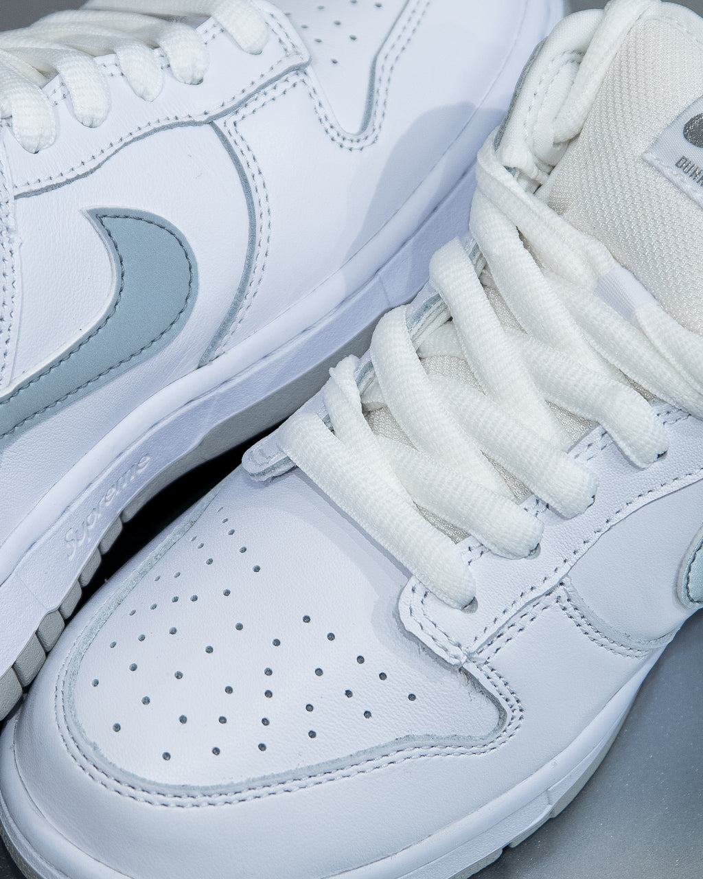 Nike SB Dunk Low ‘Supreme 94 White Metallic Silver’
