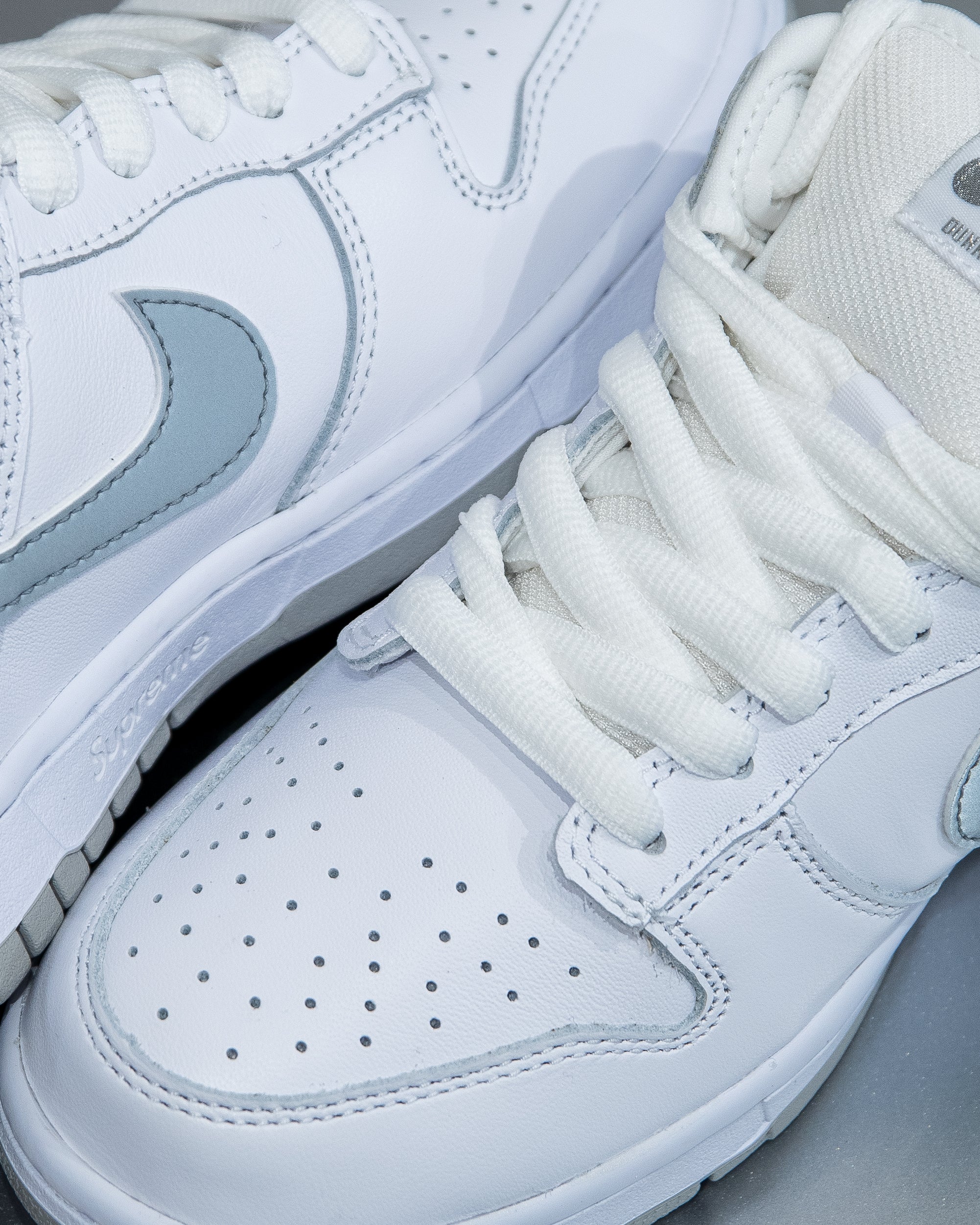 Nike SB Dunk Low ‘Supreme 94 White Metallic Silver’